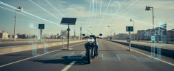Une moto électrique futuriste de 2025 parcourant une route moderne, symbolisant l'essor des technologies avancées dans le marché des motocyclettes.